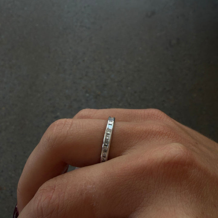 Platinum Princess Cut Channel Eternity Band - Consider the Wldflwrs